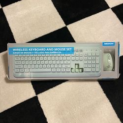 Medion Wireless Keyboard And Mouse Set Teal  Looks new in box I don’t think it was ever used. 