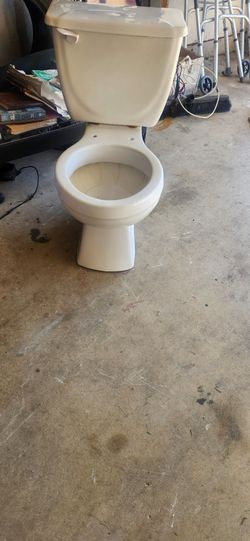 Standard Toilet Just Needs Lid.