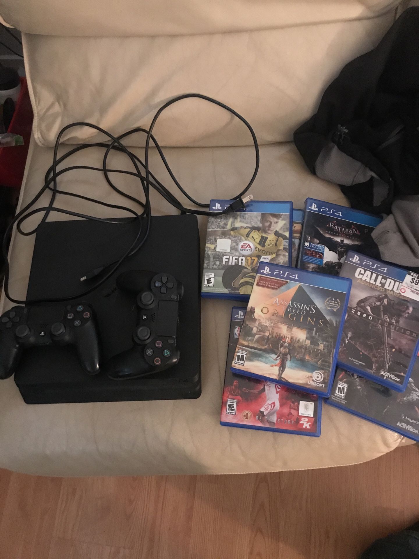 Ps4 slim 2 controllers games worth over $100 with cables. $300
