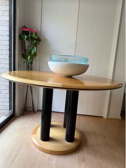 Wood and Black Column Round Dining Table