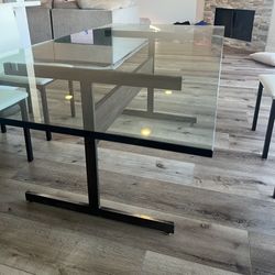Mid Century Modern Glass Dining Room Table With 4 White Chairs  