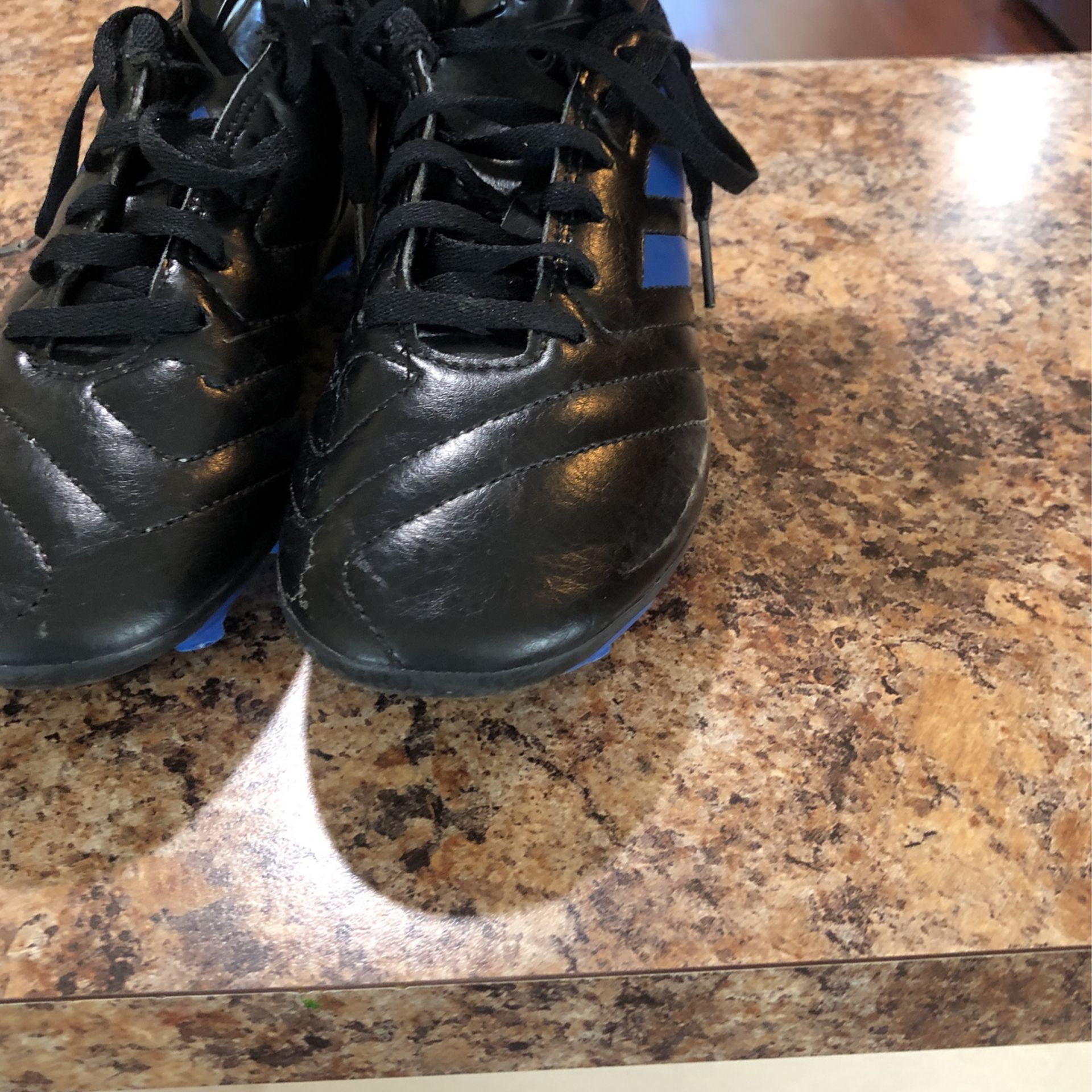Black & Blue Adidas Cleats