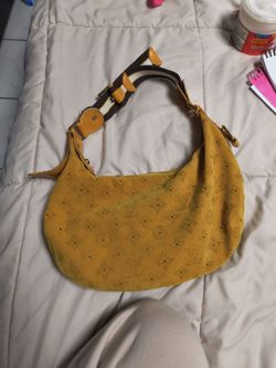 Mustard yellow purse asking for $60