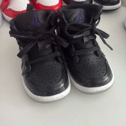 Black air jordans 1s 