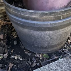 Two matching barrel planter buckets 