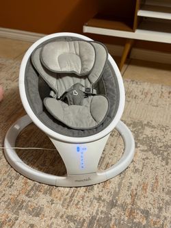 Munchkin baby swinger