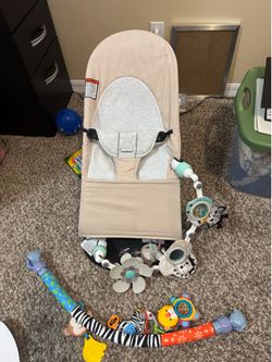Baby Bjorn with 2 hanging toys