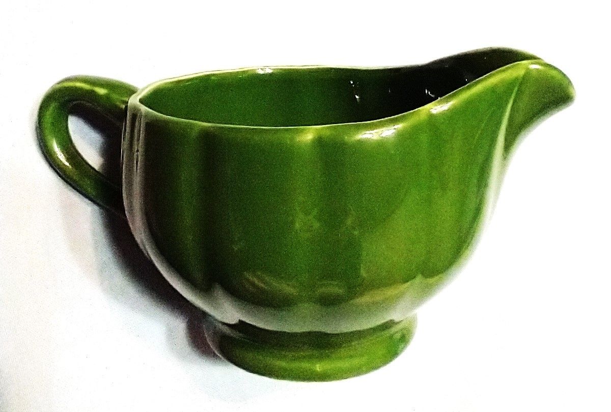 

Creamer pitcher, green, 3" x 3.5" diameter-
