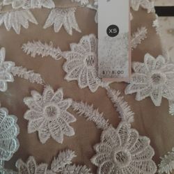 Beige and white dress extra small from a Bloomingdale's