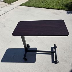 Drive adjustable feeding table