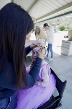 Face paintings With Gems And Glitter