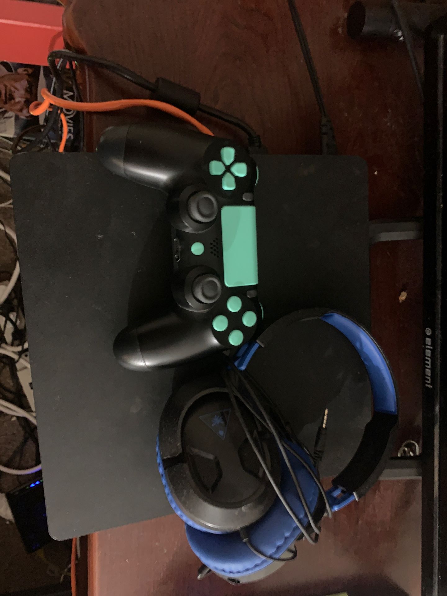 Ps4 hardly used negotiable with custom controller and turtle beach headset