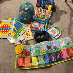 Toddler Toys. Magnets; Walker, Music, Books. Balls. $20