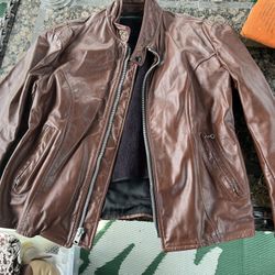 Vintage size 40 genuine leather fur lined jacket