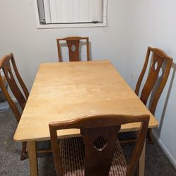 Expandable wooden dining table + chairs