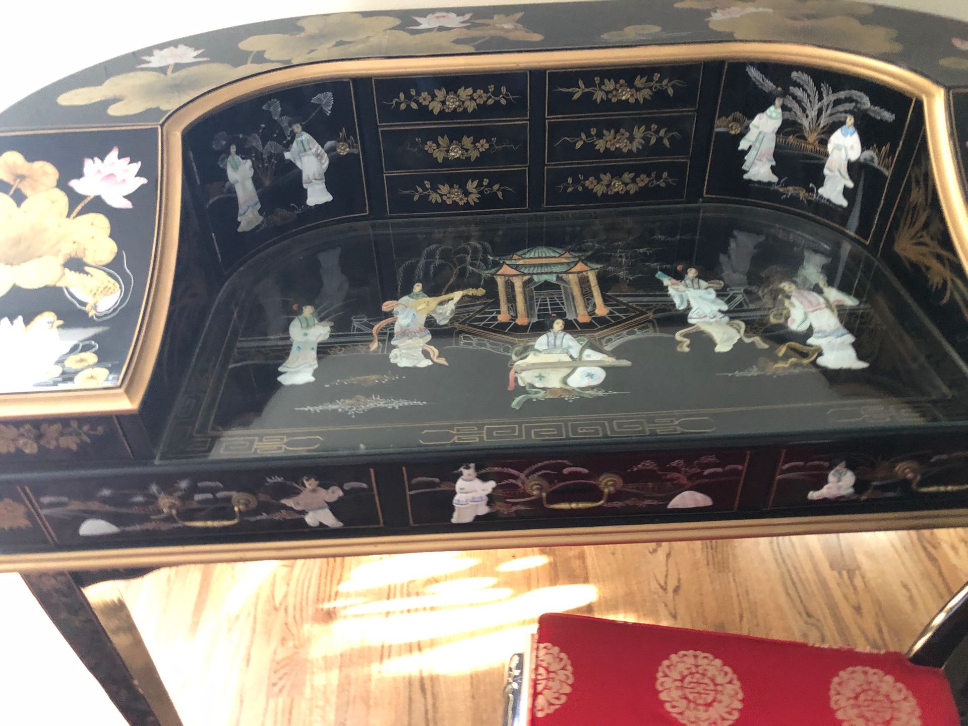 Beautiful antique lacquer Chinese desk amazing detail terrific mother of pearl inlay and what looks like Jade I can’t be safe search can’t be certain