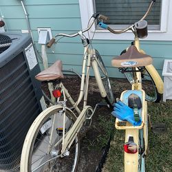 2 antique huffy bikes ( weathered a bit)
