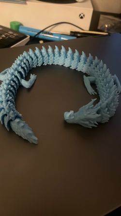 Blue 3D printed dragon