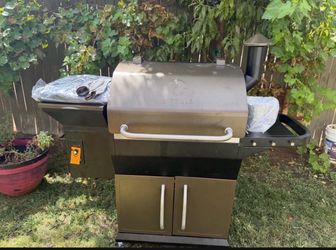 Shop Z GRILLS 1056 sq. in. Pellet Grill and Smoker in Bronze with Storage Cabinet, Includes Cover
