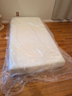 Unused twin memory foam mattress