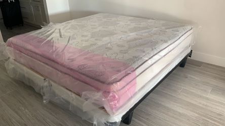 New king mattress and box springs bed frame is not included