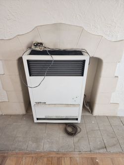 Direct-Vent Gravity Wall Heater 14,000 BTUH, 65% AFUE, Natural Gas Furnace