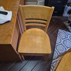 Two Light Tan Wood Chairs