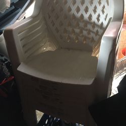 8 White Resin Chairs