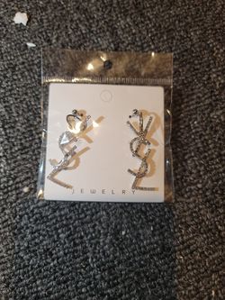 YSL YVES SAINT LAURENT LARGE GOLD TONE  EARRING