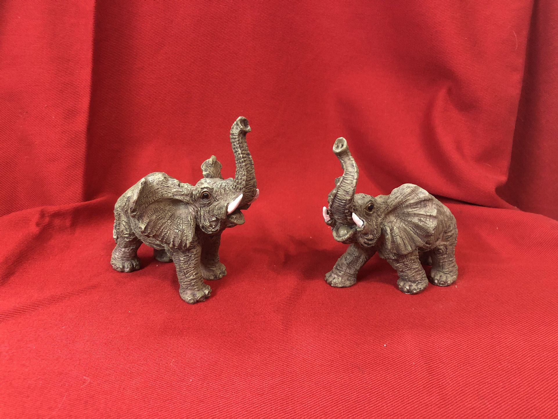Two, 4.75” Plastic Elephants