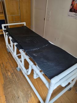 Non-magnetic shower stretcher/gueney made by MJM International.