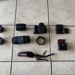 Canon SL2 DSLR Camera + extra