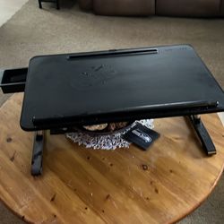 You could set it on your bed or on your chair or set it on a table