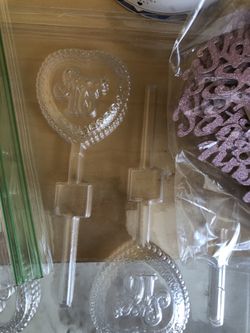 (2) bags Kalani Sweet 16 and (2) sweet 16 candy molds
