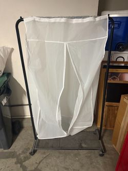 Clothes Rack w Plastic cover