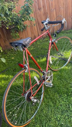 $120 schwinn Le Tour Tourist on road bike. Rear tire has slow leak, need new tube. Check more picture