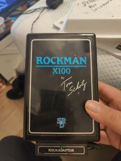 Rockman X100 Guitar Headphone Amp by Tom Scholz