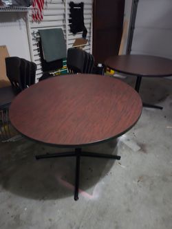 2 round tables with 8 chairs