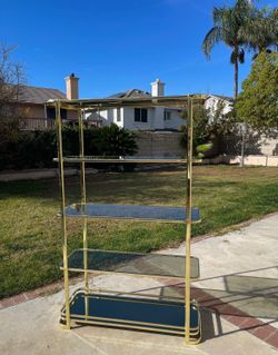 1980’s VINTAGE POSTMODERN HOLLYWOOD REGENCY BRASS & GLASS ETAGERE DISPLAY SHELF