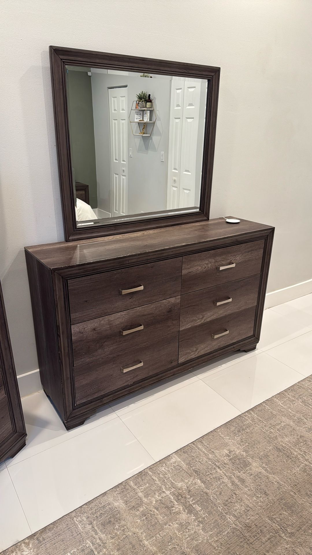 Dresser with attached mirror