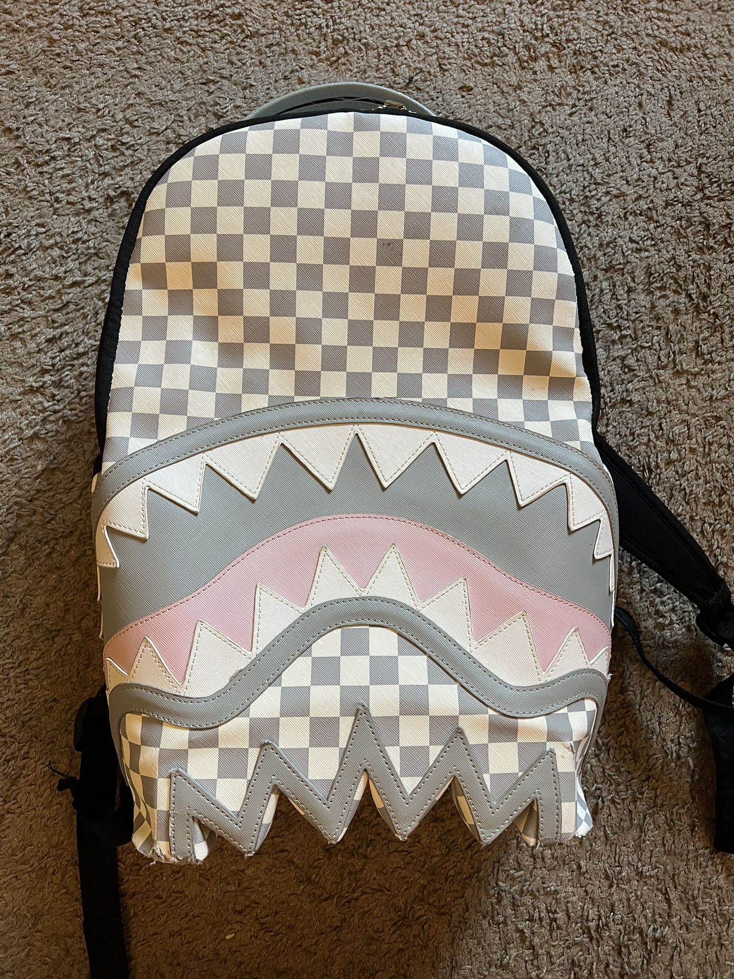 pink white n grey sprayground backpack