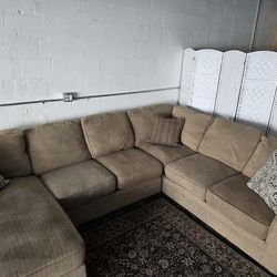 Large Ashley Furniture 4 piece sectional
Delivery options available!