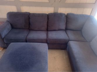 Used Ashley 113x90 sectional couch with ottoman