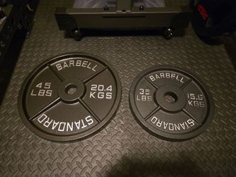 ** Like NEW ** 2" Olympic Barbell Plates 45s and 35s