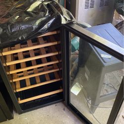 Wine Cooler Holds 28 Bottles