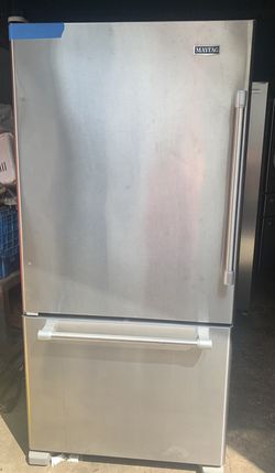 Maytag stainless steel 33in. Bottom freezer refrigerator working perfectly with 4 months warranty