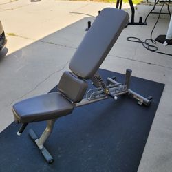 Life Fitness Adjustable Weight Bench for $250 Firm (WALNUT 91789)