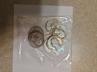 90 % silver quarters.  8 coins