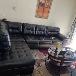 Leather Ashley Furniture Sectional PRICE IS NEGOTIABLE !!!!