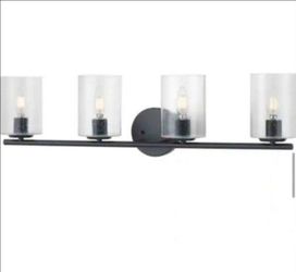 Hampton Bay
Champlain 31.5 in. 4-Light Matte Black Modern Bathroom Vanity Light with Clear Seeded Glass Shades